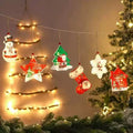 LED lampice s visećim božićnim figuricama